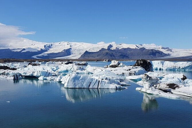 2-Day Blue Ice Cave, Glacier Lagoon and South Coast - Small Group - Day one: waterfalls, volcanic coast, and Reynisfjara