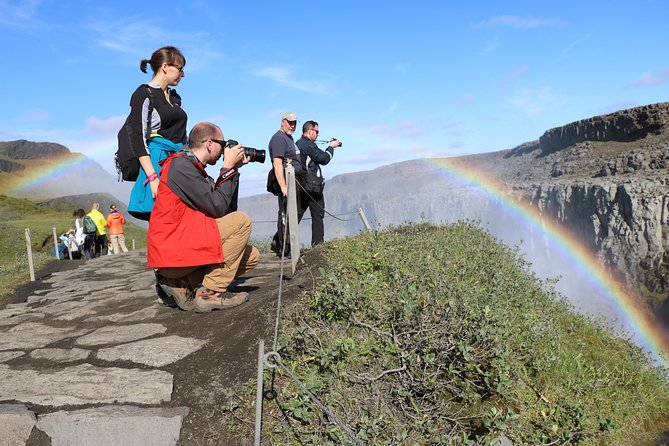 Akureyri North Iceland Waterfalls and Nature Baths Small Group Tour - Timing, clothing, and pickup details