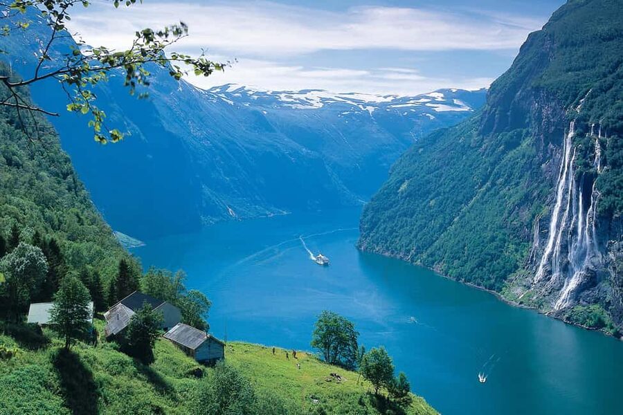 Ålesund to Geiranger Fjord Boat Tour with Return Bus Tour - Hjørundfjord begins the day on a quieter note