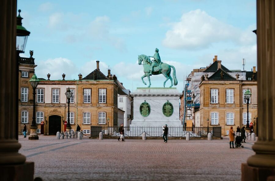 Copenhagen: Hygge & Highlights Walking Tour with Local Guide - Nyhavn, wooden ships, and time to look around