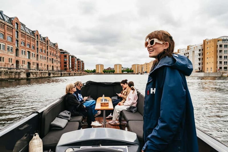 Copenhagen: Old Canals and Hidden Gems Social Boat Tour - Meeting at Ofelia Plads and boarding the black RIB