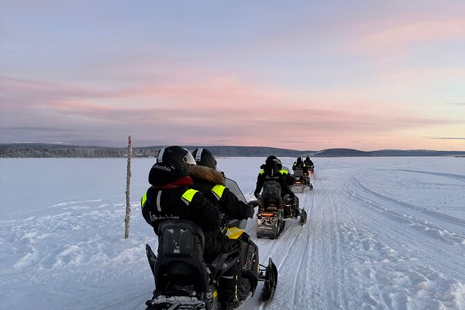 Day tour with snowmobile in Kiruna 10:30 am - Forest tracks, frozen lakes, and the chance of wildlife