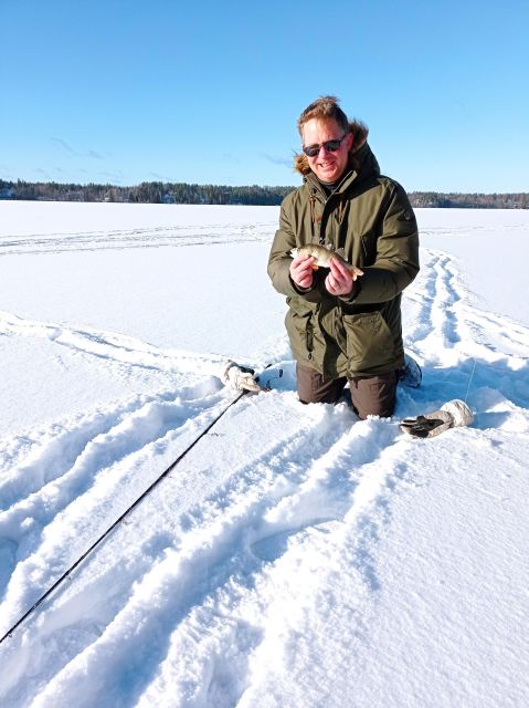 From Helsinki: Bodom Lake Ice Fishing with Food & Drinks - The laavu finale, with sausage and glögi