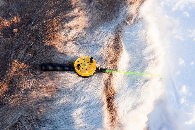 From Ivalo: Ice Fishing Safari to Lake Inari, reindeers & lunch - Lunch beside an open fire