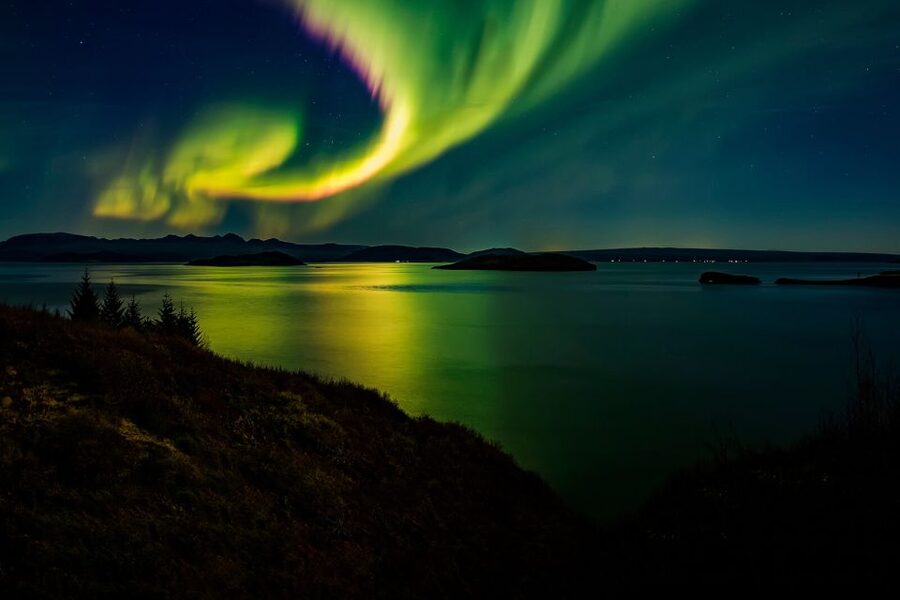 From Reykjavik: Northern Lights Chase with Expert Guide - From Reykjavik Pickup to the First Dark Stop