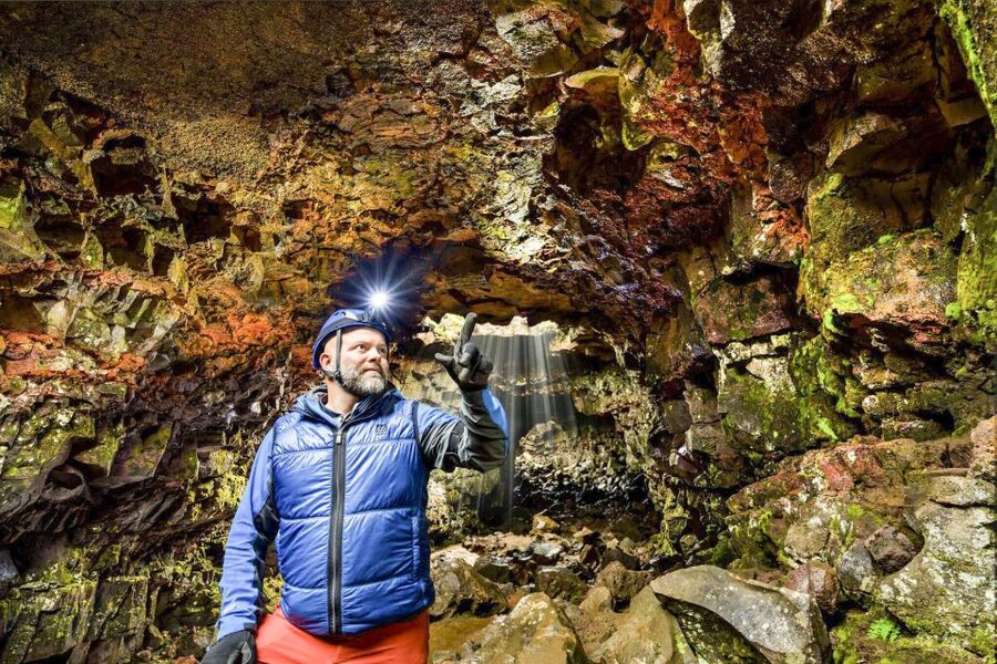 From Reykjavik: Raufarhólshellir Lava Tunnel by Bus - Colored walls, metal paths, and rough rock
