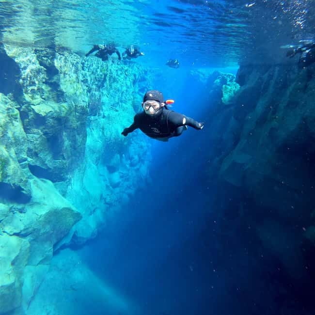 From Reykjavík: Silfra Snorkeling with free photos - Getting ready for a dry-suit swim