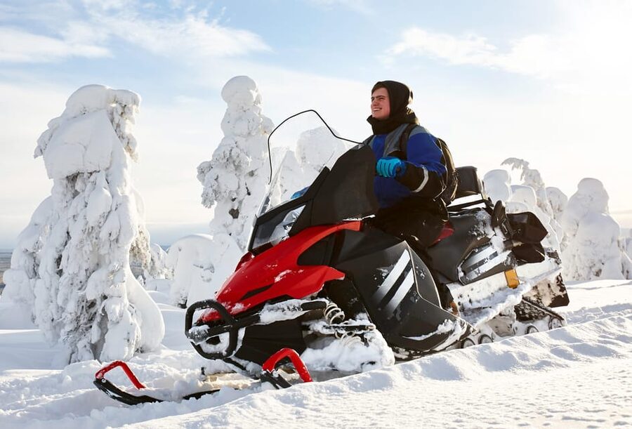 From Rovaniemi: 2-Hour Snowmobile Safari - Following the trail across frozen water