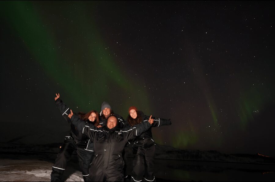 From Tromsø: Northern Lights Tour in Minibus with Photos - Starting at Tromsø City Library after dark