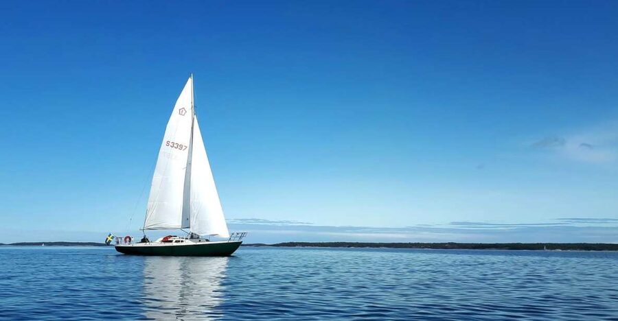 Full-Day Stockholm Archipelago Sailing Tour - Taking the wheel under the captain’s eye
