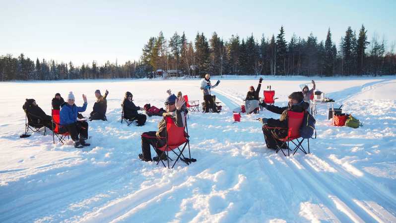 Ice fishing program in Lapland - Cutting through thick ice on a Finnish lake