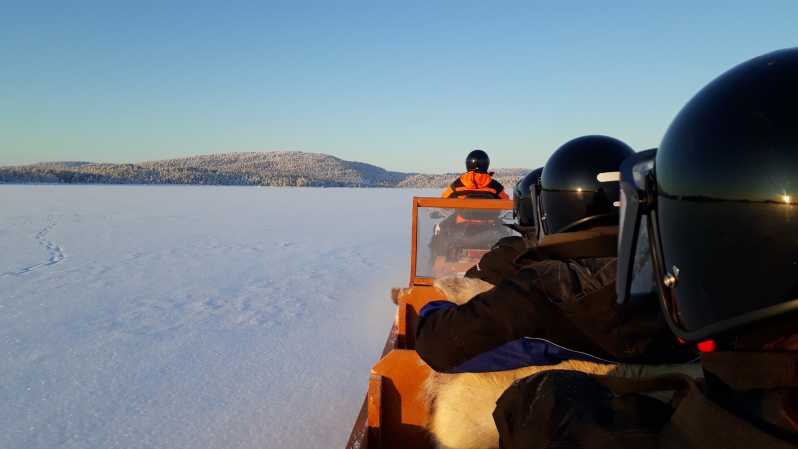 Ivalo: Ice Fishing Tour to Lake Inari, Reindeers & Lunch - Learning the quiet art of ice fishing