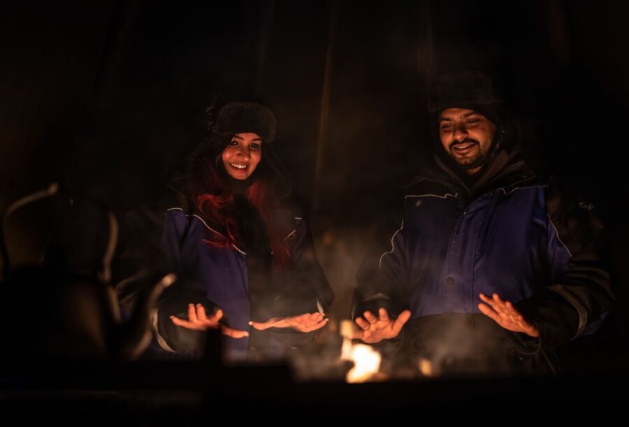 Ivalo: Lake Inari Northern Lights Tour w/ Reindeer & Dinner - A snowmobile sleigh ride across frozen Lake Inari