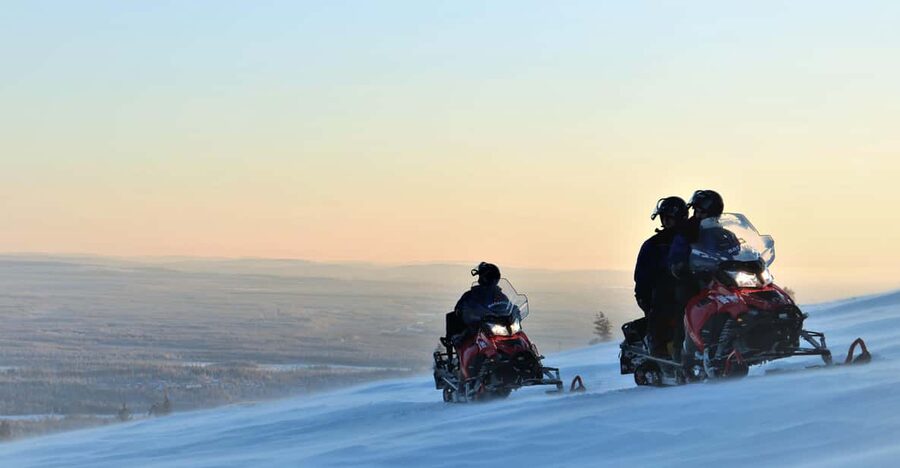 King of Ylläs: Snowmobiling to the Hill - A hot drink and doughnut at the hill cafe