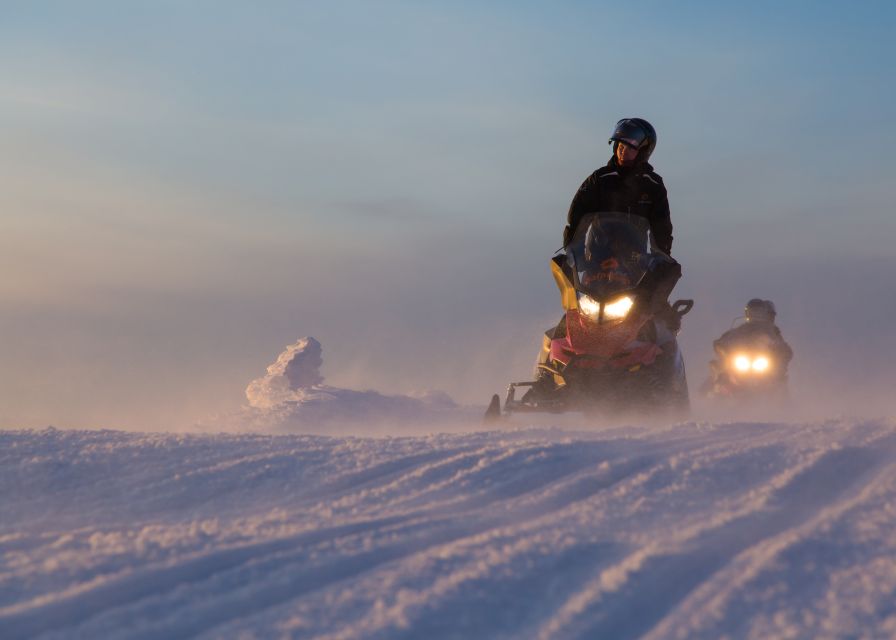 Levi: Evening Snowmobile Safari - The campfire stop in the snowy forest