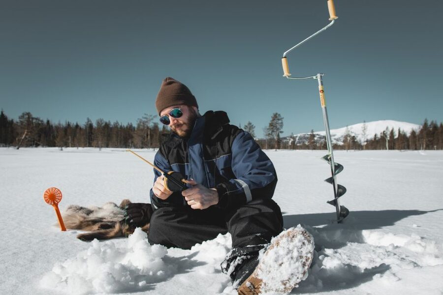 Levi: Finnish Ice Fishing Tour by Car - Getting dressed for Laplands cold
