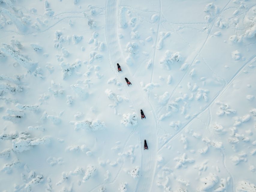 Levi: Snowmobile Safari with Ice Fishing and Outdoor Lunch - Learning the practical side of ice fishing