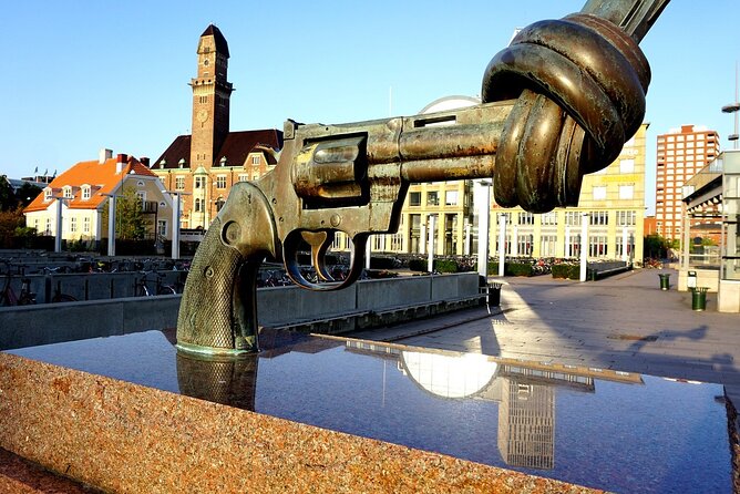 Malmö Walking Tour: Explore Top Sights & Hidden Gems - Slottsparken and Malmö Castle: greenery beside the old fortress