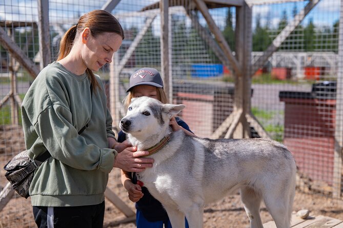 Meet 70 Huskies and Enjoy a short ATV Tour with the Huskies - Riding beside the dogs on an ATV