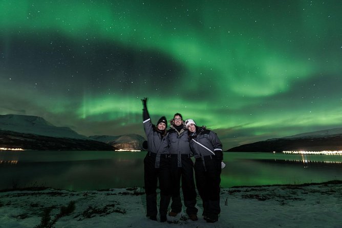 Minibus Northern Lights Chase with Photography from Tromsø - Waiting beside a fjord, forest, or frozen lake