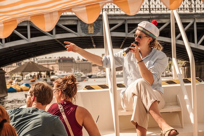 Open Electric Boat Ride in Stockholm with Live-Guide - Boarding beside Gustav III on Skeppsbron