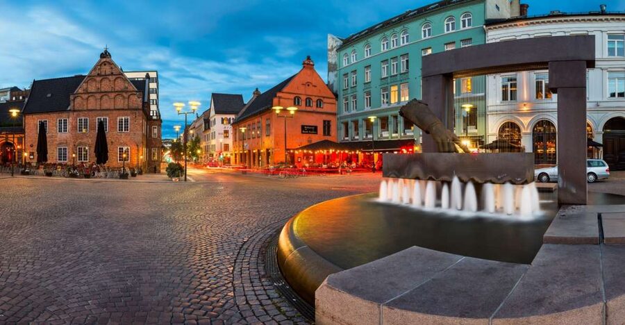 Oslo: Historic Myths & Legends Evening Walking Tour - Christiania Torv and the old city’s turning points
