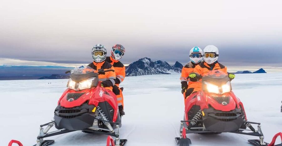 Reykjavík: Langjökull Glacier Snowmobile Tour with Ice Cave - Riding across the white surface of Langjökull