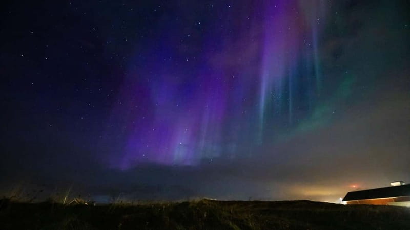 Reykjavik: Northern Lights Adventure Tour with Hot Chocolate - Leaving Reykjavik’s city glow behind