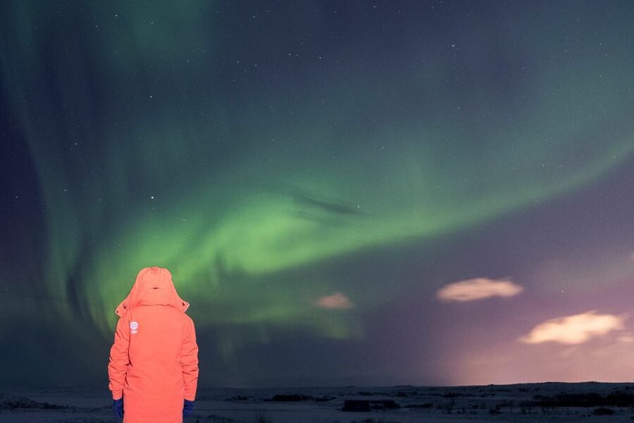 Reykjavik: Northern Lights Group Tour with Photos - Hot chocolate, small groups, and the practical comfort level