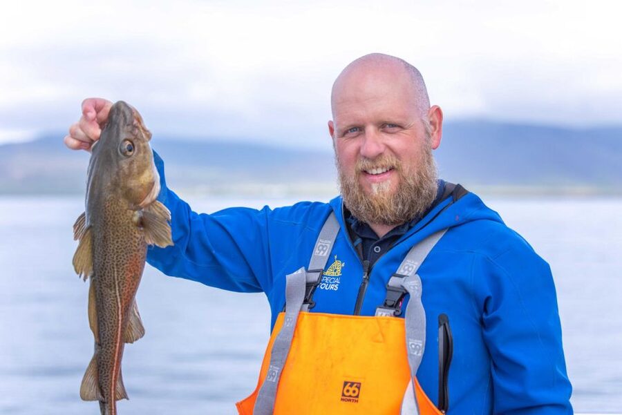 Reykjavik: Sea Fishing Boat Tour & BBQ with the Day's Catch - Grilling the catch with potatoes onboard