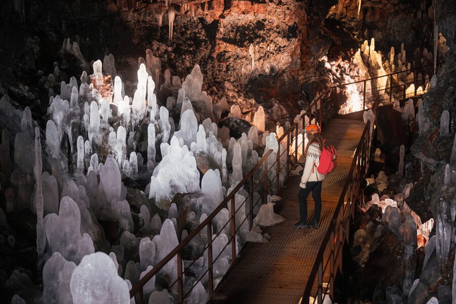 Reykjavík: Silfra Fissure Snorkeling and Lava Caving Tour - From volcanic darkness to clear blue water