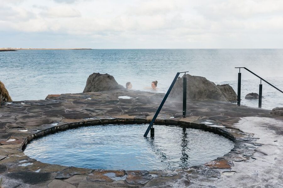 Reykjavik: Sky Lagoon Admission with Transfer - The warm lagoon and infinity edge