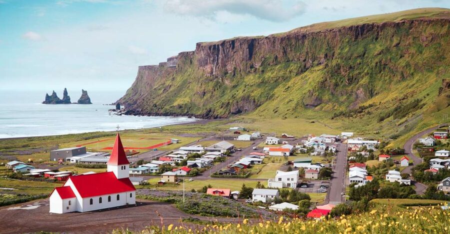 Reykjavik: South Coast Waterfalls & Glacier Small-Group Tour - Vík combines lunch, village views, and a useful pause
