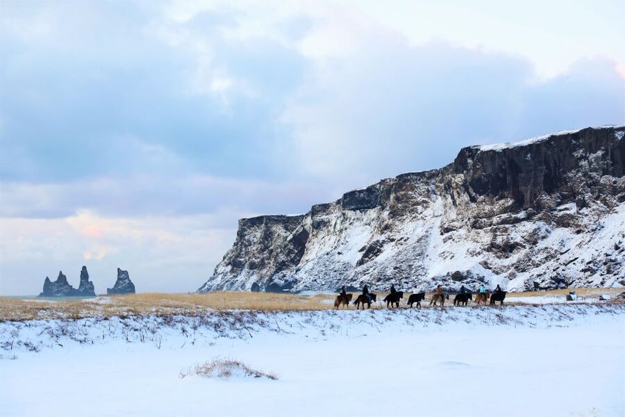 Reykjavik: South Coast Waterfalls & Glacier Small-Group Tour - Reynisfjara shows Iceland at its most dramatic
