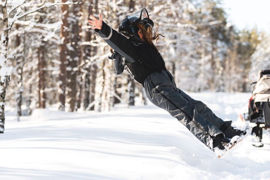 Rovaniemi: Family Snowmobile Safari with Campfire and Snacks - Getting dressed for Lapland