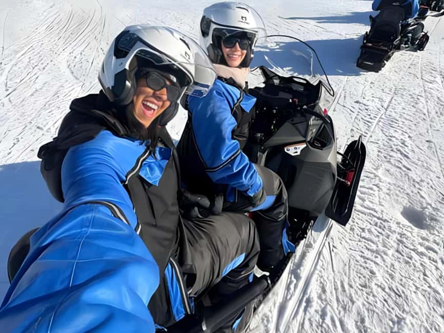 Rovaniemi: Guided Wilderness Snowmobile Safari & Barbeque - One snowmobile, two drivers, and two short loops