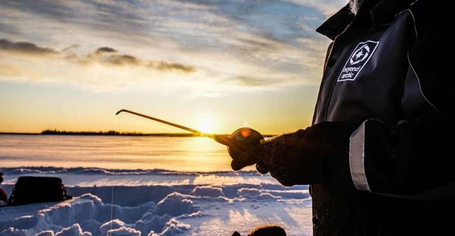 Rovaniemi: Ice Fishing on a Frozen Lake with BBQ and Photos - Learning how ice fishing works