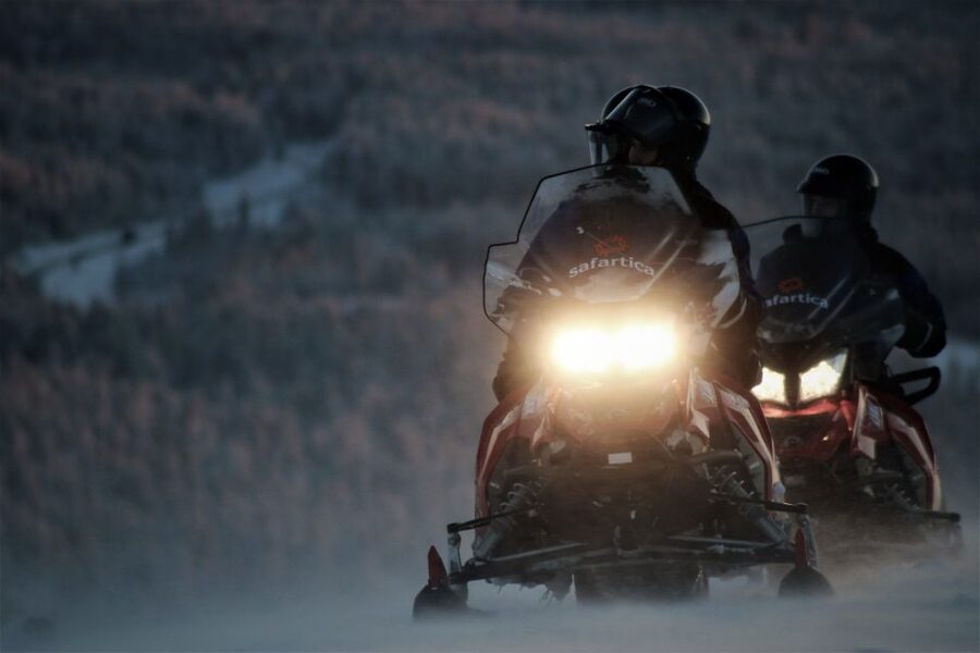 Saariselkä: Evening Snowmobile Tour with Fire & picnic - The fire stop: sausage, pastry, and hot drinks