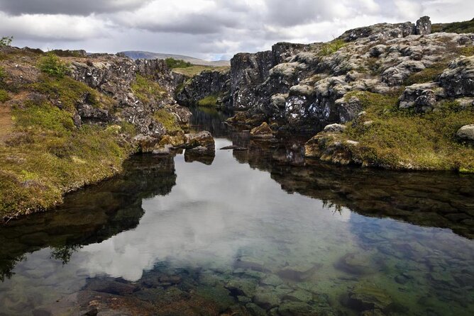 Silfra Drysuit Snorkeling Tour with Free Photos - From Reykjavik - Silfra Snorkeling at a Glance