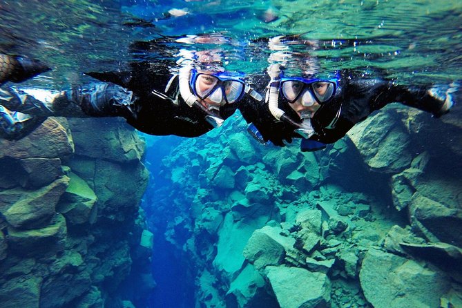 Silfra Drysuit Snorkeling Tour with Free Photos - From Reykjavik - Walking Out and Warming Up
