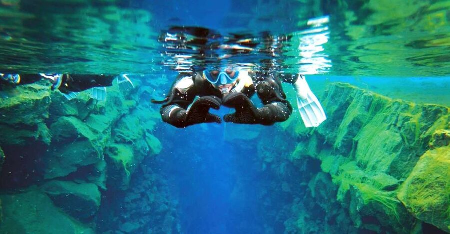 Silfra: Fissure Snorkeling Tour with Underwater Photos - The dry suit: warm body, awkward walk