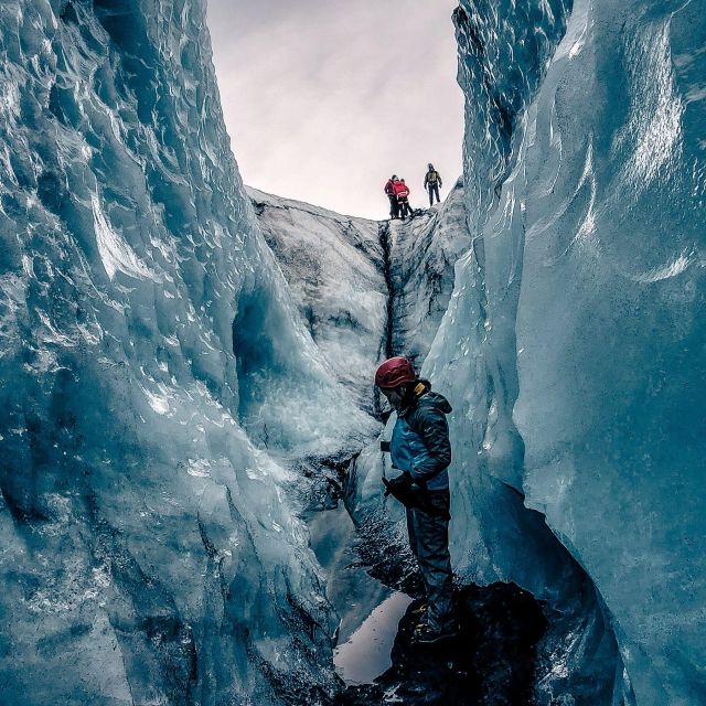 Sólheimajökull Ice Climbing Tour - Getting fitted with crampons and ice tools