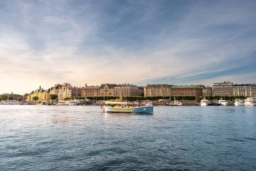 Stockholm: Guided City Sightseeing Open Electric Boat Tour - Royal Palace and the Royal Dramatic Theatre