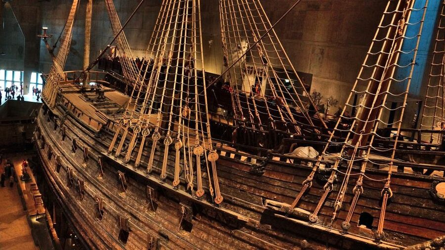 Stockholm: Old Town Walking Tour w/ Vasa Museum & Boat Ride - Walking through Gamla Stan’s narrow lanes