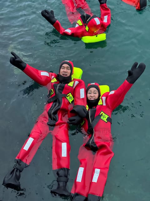 Tromsø: Arctic Fjord Floating in Survival Suit - From Magic Ice Bar to Kaldfjord