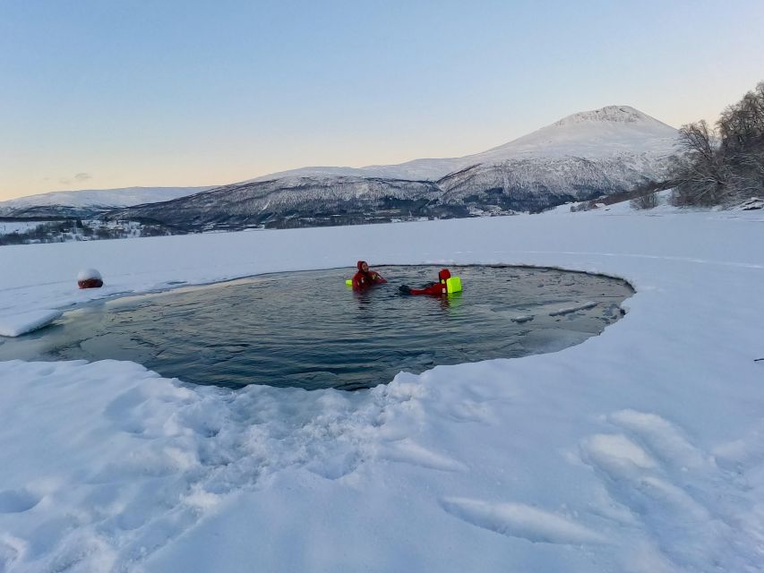 Tromsø: Arctic Floating with Snacks and Drinks - Floating in the frozen fjord at Ramfjordbotn