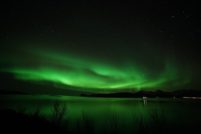 Tromso Aurora Chase by Minibus with Thermal Suit, Snack and Photo - Waiting outside with a thermal suit and fire